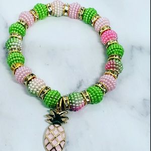 Pink and green pineapple charm bracelet